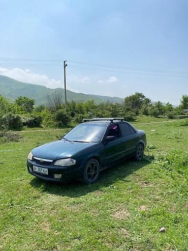 мазда демио задний стоп: Mazda Familia: 2001 г., 2 л, Автомат, Бензин, Седан — 4