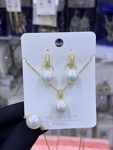 золото комплект: Ювелирные гарнитуры Gulkina, коллекция 585RG. - Состав каждого — 8
