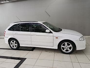 mar x: Mazda Familia: 2001 г., 2 л, Автомат, Бензин, Хэтчбэк — 9