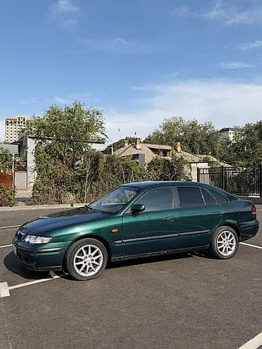 spark 2012: Mazda 626: 1997 г., 1.8 л, Механика, Бензин, Седан — 4