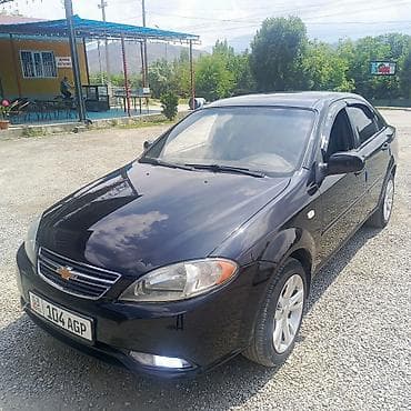 спарк капот: Daewoo Gentra: 2013 г., 1.5 л, Механика, Газ, Седан — 6