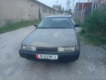 e90 bmw: Mazda 626: 1991 г., 2 л, Механика, Бензин, Лифтбек — 6