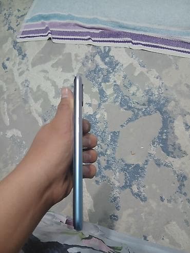 ayfon se: Смартфон с каплевидным вырезом экрана, синий корпус. Характеристики и — 7