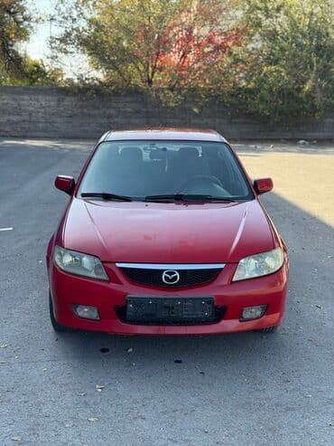 трейлер дом на колесах: Mazda 323: 2001 г., 2 л, Механика, Дизель, Хэтчбэк — 1