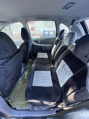 Транспорт: Nissan Almera Tino: 2004 г., 1.8 л, Кол менен иштөөчү, Бензин, Хетчбек — 6
