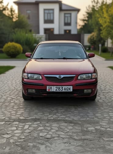 Mazda 626: 1999 г., 1.8 л, Механика, Газ, Седан