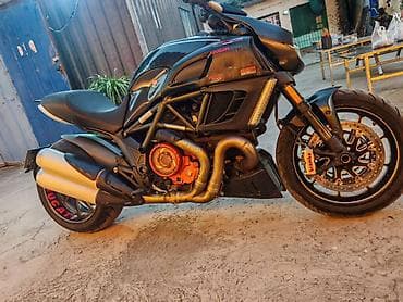 спортивные мотоциклы ducati: Ducati Diavel (чёрный матовый) — мощный крузер/родстер с фирменной — 5