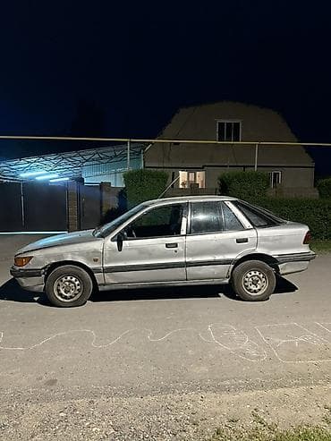 митсубиси спейк стар: Mitsubishi Lancer: 1990 г., Седан — 3
