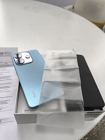 aipad mini 6: Смартфон Redmi Note 14 в голубом цвете — 6