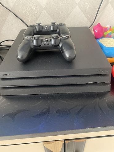 garmin 8 pro: Игровая консоль Sony PlayStation 4 Pro (чёрная) + 2 геймпада DualShock — 3