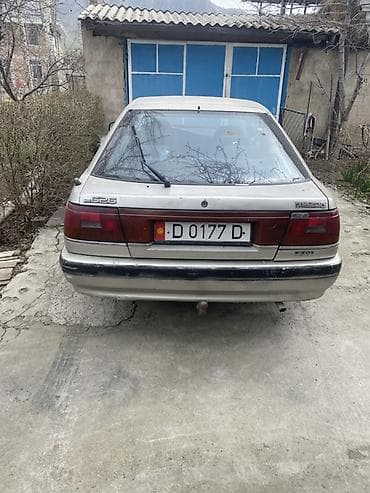 124 унверсал: Mazda 626: 1985 г., Седан — 1