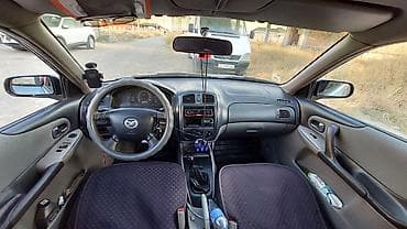mazda 6 машина: Mazda 323: 2001 г., 1.6 л, Механика, Бензин, Универсал — 6