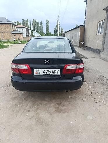 матор кайык: Mazda 626: 1999 г., Кол менен иштөөчү, Бензин, Седан — 4