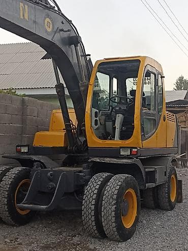 купит погрузчик: Экскаватор, Volvo, Колесный — 5