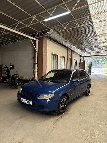 сокулук арал: Mazda 323: 2001 г., 1.6 л, Кол менен иштөөчү, Бензин, Хетчбек — 4