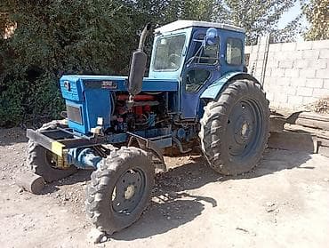 кун трактора: Трактор т40 колесный 4x4, синего цвета, с закрытой кабиной — 2