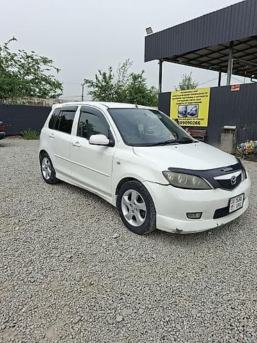 Mazda Demio: 2002 г., 1.5 л, Автомат, Бензин, Хэтчбэк