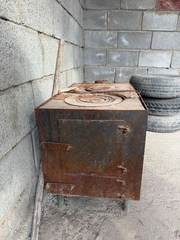 продаю мантоварку: Металлическая дровяная печь-буржуйка с варочной поверхностью — 1