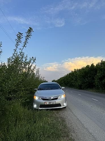 калдина 1 8: Toyota Camry: 2012 г., 2.5 л, Автомат, Гибрид, Седан — 6