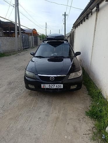 Mazda 323: 2002 г., 1.6 л, Автомат, Бензин, Универсал — 2
