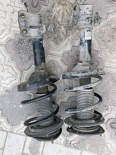 Унаа тетиктери: Алдыңкы амортизатор Subaru Оригинал — 1