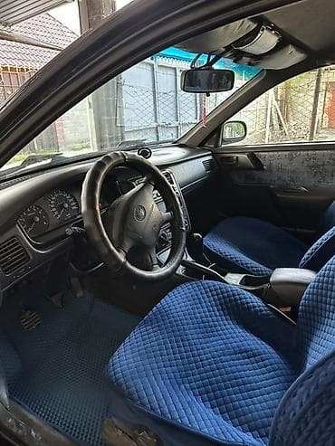 2 куб: Toyota Carina E: 1997 г., 1.8 л, Механика, Бензин, Универсал — 6