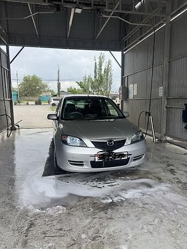 sm 5: Mazda Demio: 2004 г., Автомат, Бензин, Хэтчбэк — 1