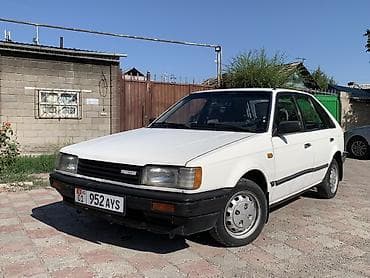 Продажа авто: Mazda 323: 1987 г., 1.5 л, Механика, Бензин, Хэтчбэк — 4