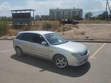буксир: Mazda 323: 2003 г., Механика, Бензин, Универсал — 2