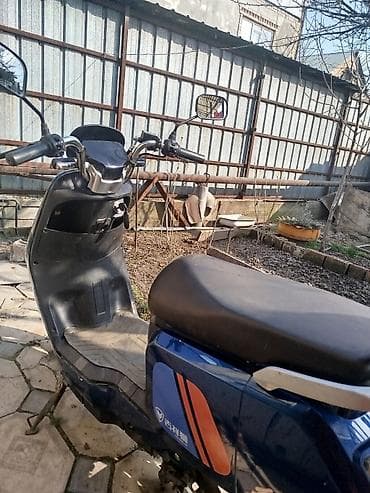 мото желмайан: Электрический скутер (синий)-Батарея литевая 500 -55км в час почти не — 5