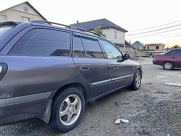 Продажа авто: Mazda Capella: 1998 г., 2 л, Механика, Бензин, Универсал — 6