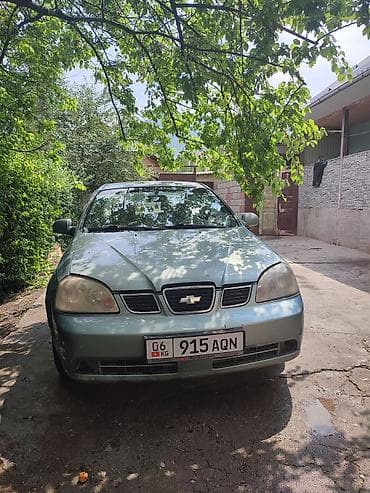Унаа: Chevrolet Lacetti: 2003 г., 1.5 л, Кол менен иштөөчү, Бензин, Седан — 1