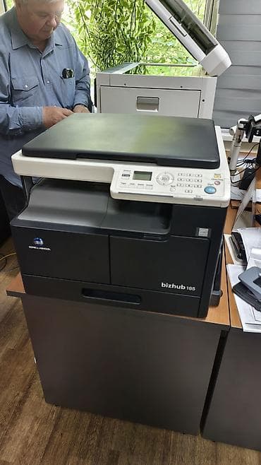 Принтерлер: МФУ Konica Minolta bizhub 185 и фотопринтер Epson Stylus Photo 1410 в — 1