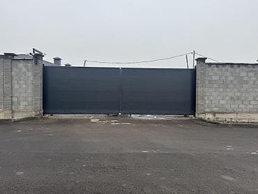 Секционные ворота: Секционные промышленные ворота с калиткой - Тип: подъемно-секционные — 10