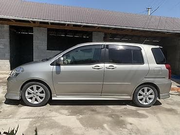 юмузу трактор: Toyota Raum: 2003 г., Автомат, Бензин — 4