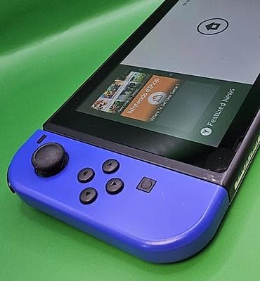 switch прошитый: Игровая консоль Nintendo Switch с разноцветными Joy‑Con (левый — — 8