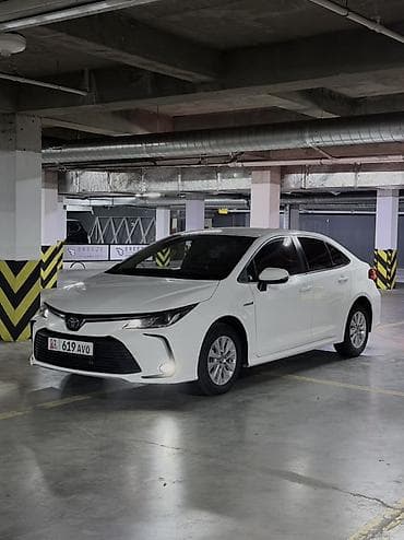 byd e2 2022: Toyota Corolla: 2019 г., 1.8 л, Вариатор, Гибрид, Седан — 1