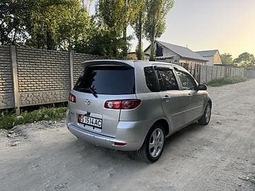 мазда катела: Mazda 2: 2006 г., 1.4 л, Механика, Газ, Хэтчбэк — 6