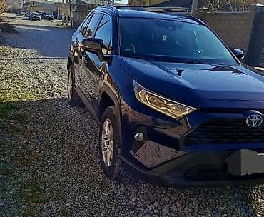 bwb e34: Toyota RAV4 Hybrid XLE (поколение XA50), темно‑синий кроссовер. не — 2