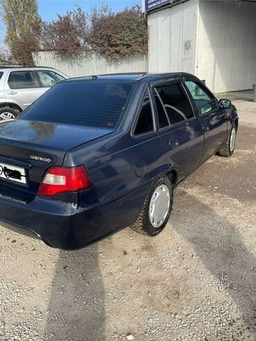 дом на калесох: Daewoo Nexia: 2009 г., 1.6 л, Механика, Бензиновая, Седан — 9