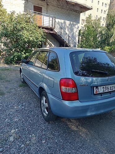 mazda 121: Mazda Familia: 2002 г., 1.5 л, Автомат, Бензин, Универсал — 4