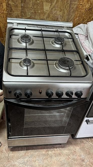 газовой плиты: Газовая плита с духовкой, нержавеющая сталь - Варочная панель на 4 — 1