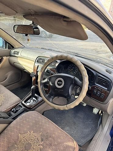 audu a4: Subaru Legacy: 2001 г., 2.5 л, Автомат, Газ, Универсал — 5