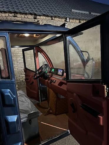 универсалга алмашам: Грузовой трицикл BOBO Motors с самосвальным кузовом Функционал и — 3