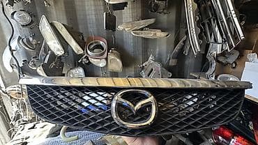 Решетка радиатора Mazda Оригинал