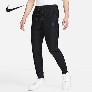 штаны мурской: Мужские спортивные штаны Nike (черные) - Прямой крой с зауженными — 2