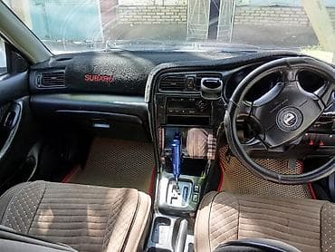 kia optima 2017: Subaru Legacy: 2003 г. — 5