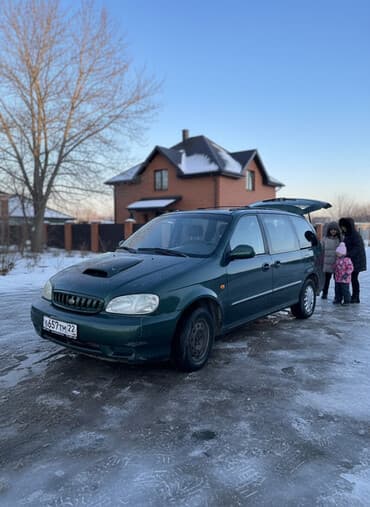 пистолет с глушителем: Kia Carnival: 2003 г., 2.9 л, Автомат, Дизель, Минивэн — 1