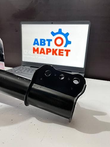 mazda: Передний амортизатор Mazda 2002 г., Новый — 2