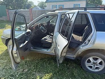 Транспорт: Hyundai Santa Fe: 2002 г., 2 л, Механика, Дизель — 9
